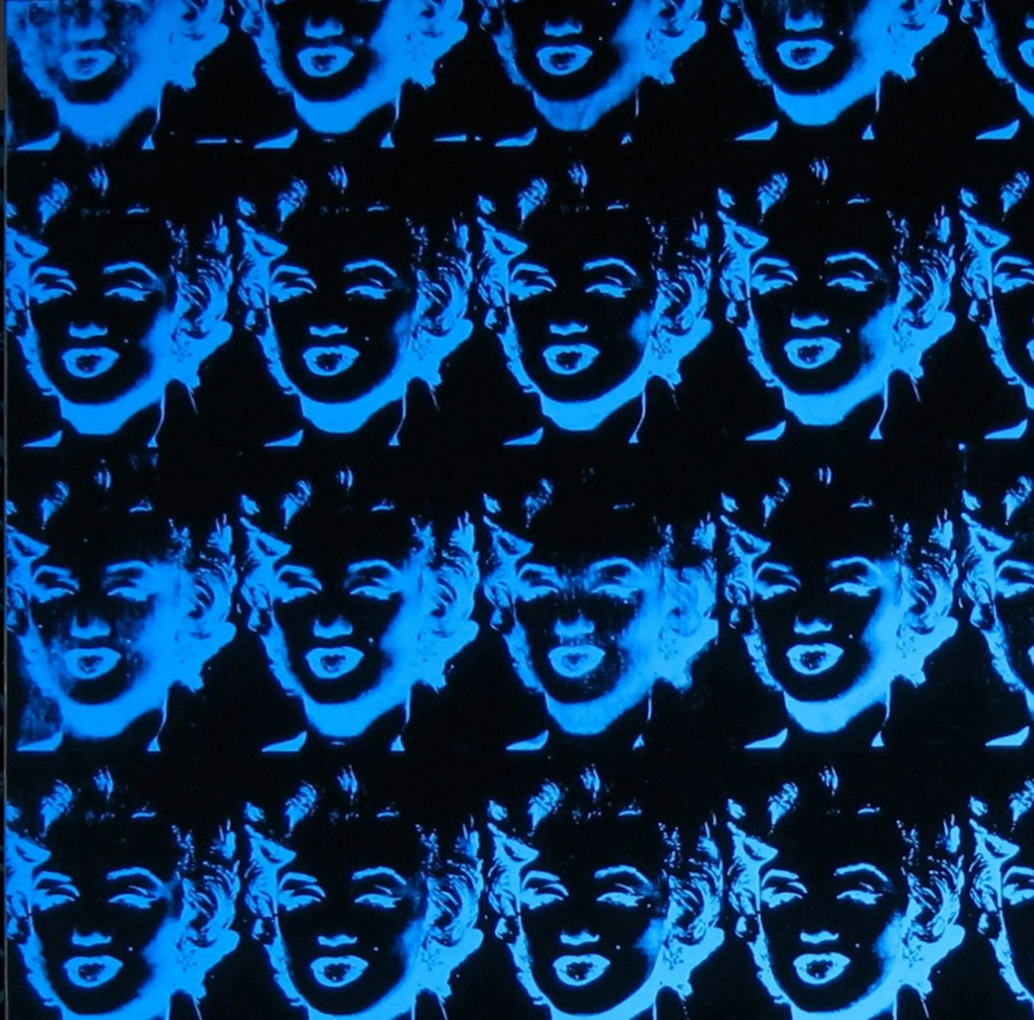 Pattern of blue neon glowing Marilyn Monroe faces on black background
