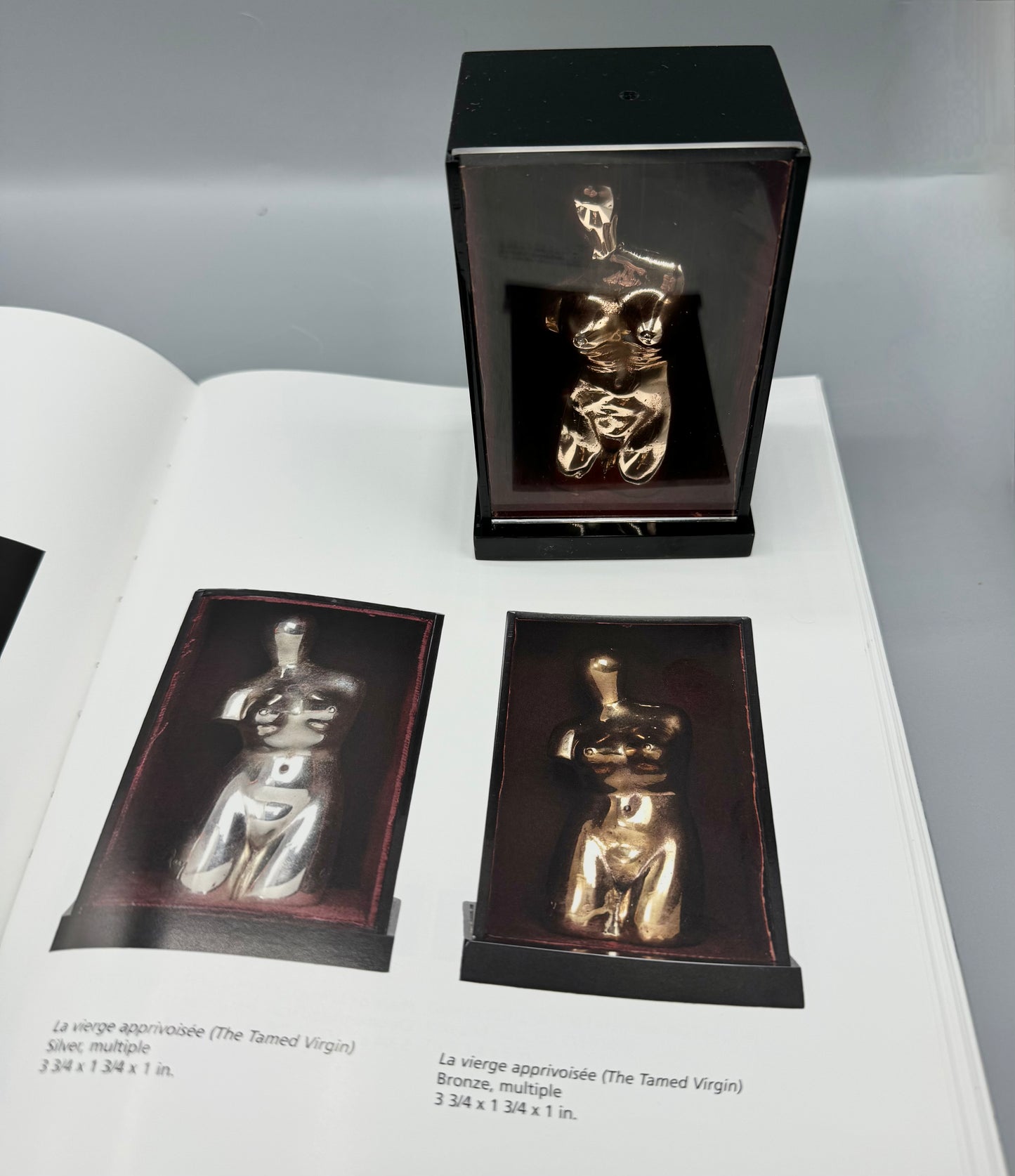 Man Ray
Vierge apprivoisée /Domesticated Virgin (Let me out), 1969
Bronze Ready-Made Sculpture in Original Plexiglass Presentation Box