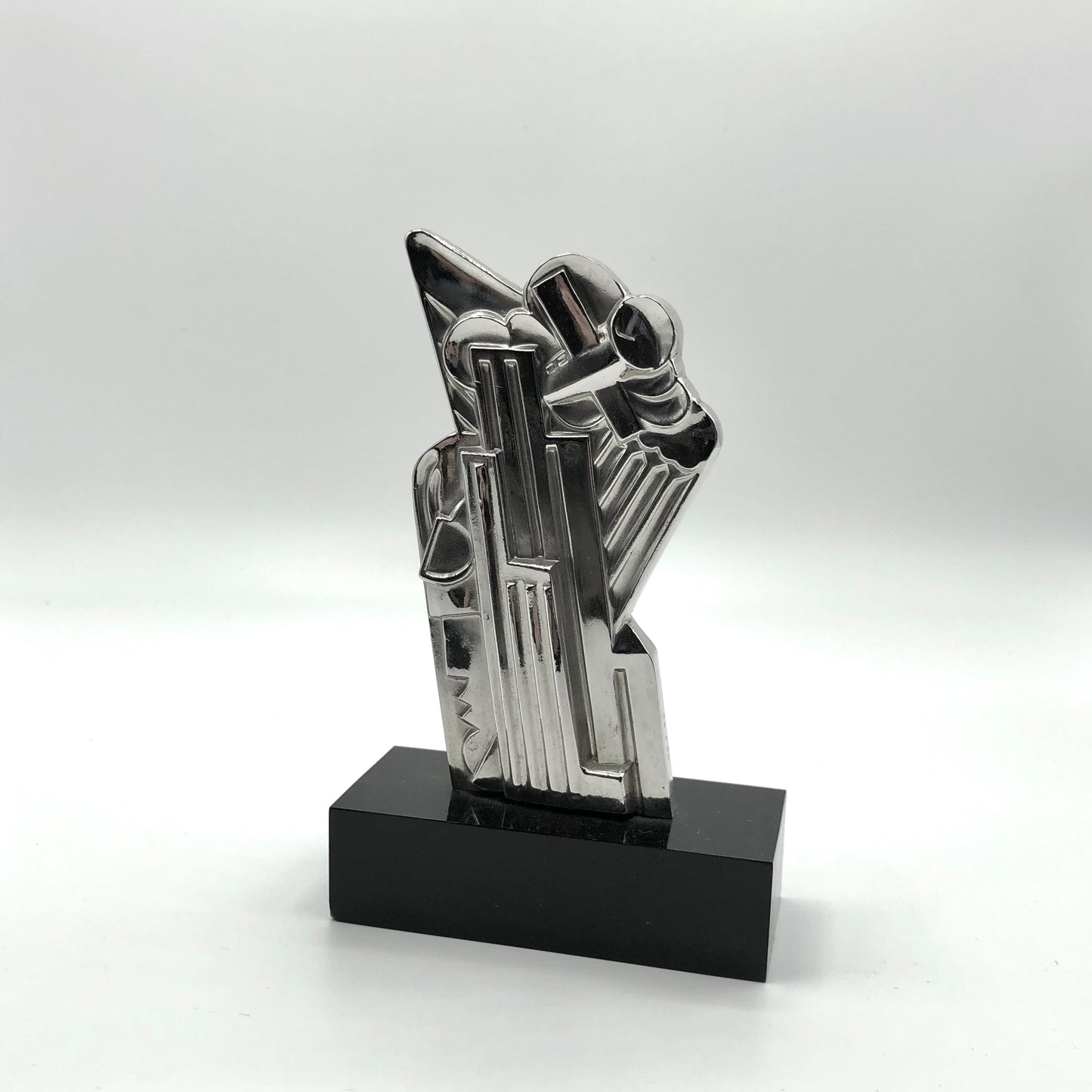 Roy Lichtenstein
Salute to Airmail, 1968
solid silver Multiple with plexiglas base