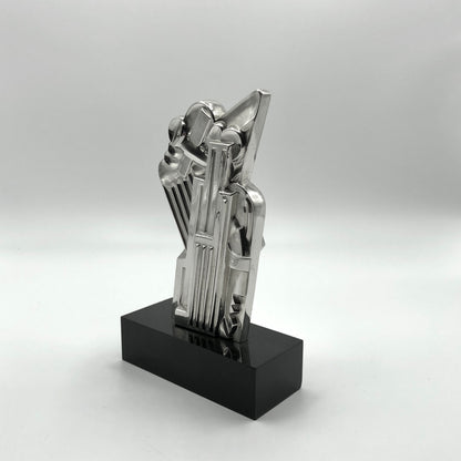 Roy Lichtenstein
Salute to Airmail, 1968
solid silver multiple on black plexi base 